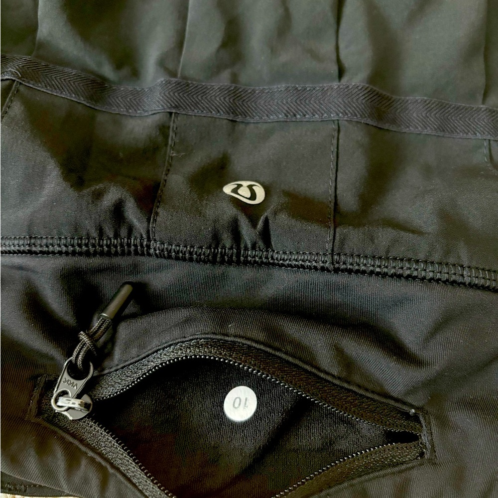 Lululemon tennis skirt black size 10 women’s. Pace rival mid-rise skort.